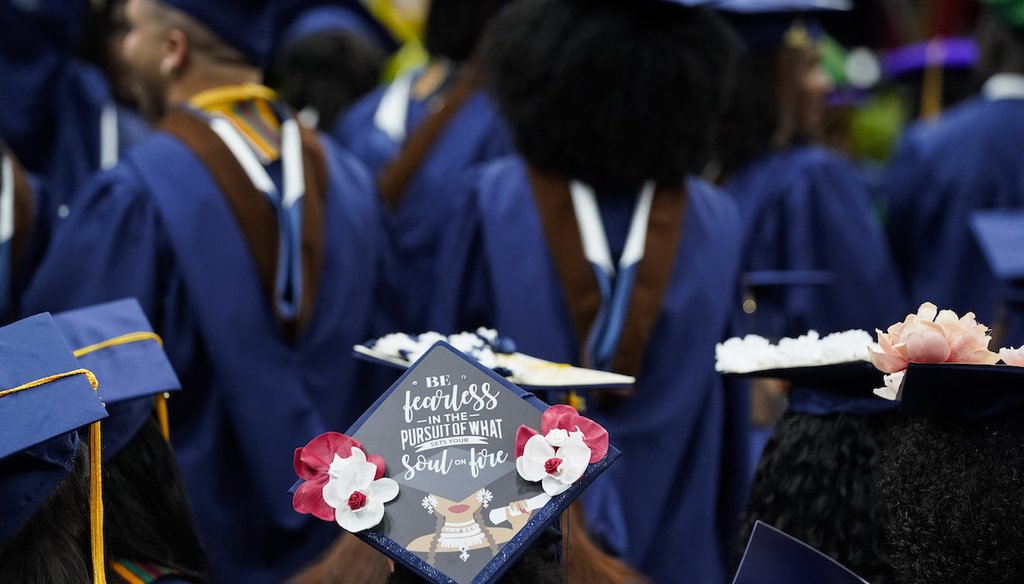 A graduate wears a decorated cap during Howard University's commencement in Washington, May 13, 2023. (AP)