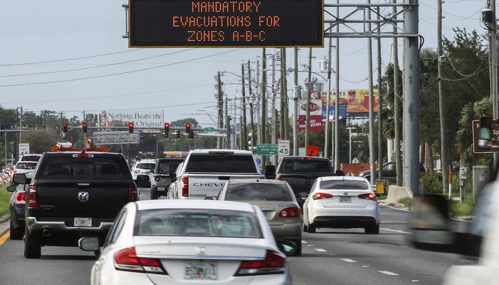 In this image taken with a drone, traffic flows eastbound along Interstate 4 as residents continue to follow evacuation orders ahead of Hurricane Milton, Tuesday, Oct. 8, 2024, in Tampa, Fla. (AP)