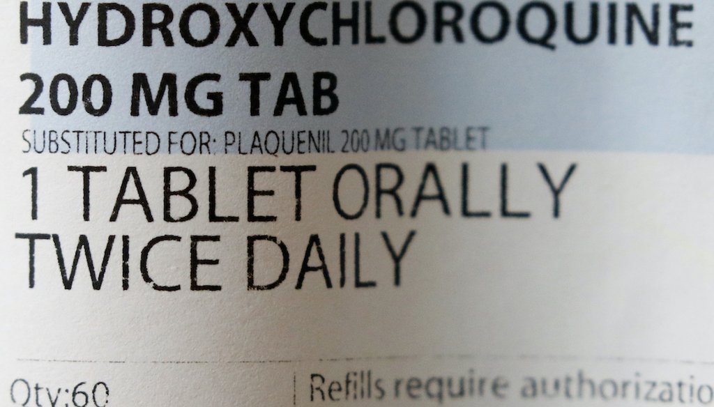 A bottle containing a prescription of hydroxychloroquine . (AP)