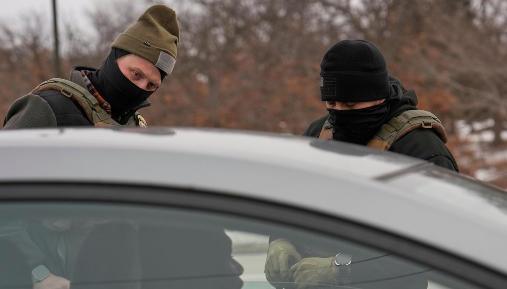 Immigration and Customs Enforcement (ICE) agents work during a traffic stop, Jan. 11, 2026, in Robbinsdale, Minn. (AP)