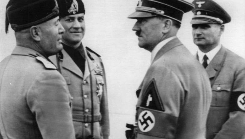 Adolf Hitler, right foreground, and Italy's Benito Mussolini, left are shown during a Hitler visit in Italy in 1938. Italy's Foreign Minister Count Galeazzo Ciano, and Hitler's Deputy Rudolf Hess behind. (AP)