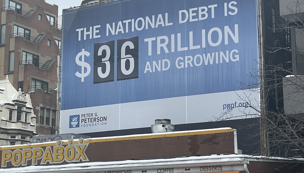 A billboard in downtown Washington, D.C., on Jan. 8, 2025. (Louis Jacobson/PolitiFact)