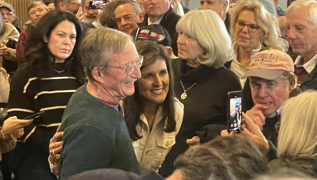 Republican presidential candidate and former United Nations Ambassador Nikki Haley meets voters Jan. 17, 2024, after a rally in Rochester, N.H. (Louis Jacobson/PolitiFact)