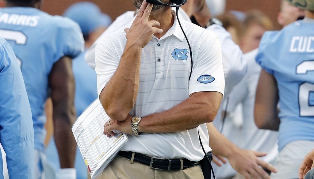 North Carolina head coach Larry Fedora walks the sidelines during the second half of Notre Dame's 33-10 victory over UNC at Kenan Stadium in Chapel Hill, NC Saturday, Oct. 7, 2017.