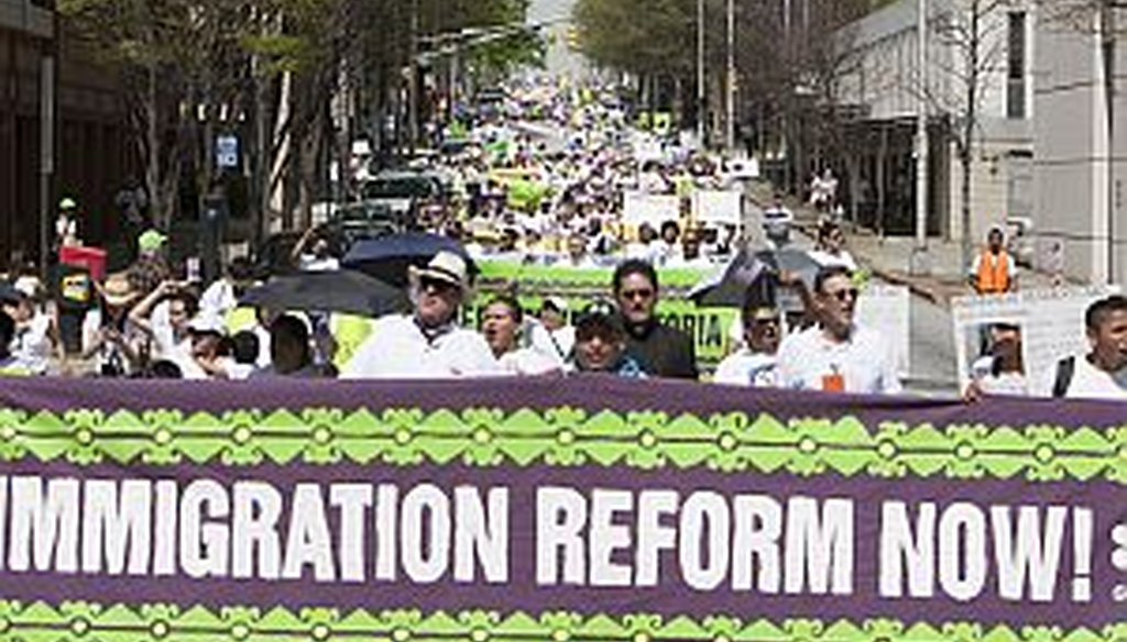 Hundreds of immigrants from Georgia and surrounding areas marched around the state Capitol in April in favor of immigration reform. (AJC photo/Johnny Crawford)