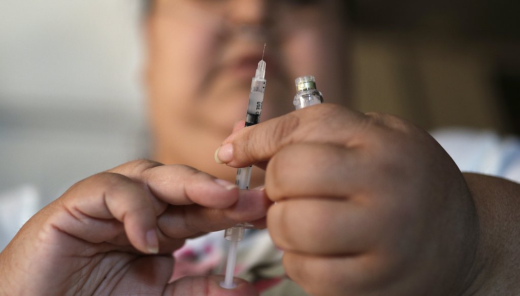 In this April 18, 2017 file photo, a woman with Type 2 diabetes prepares to inject herself with insulin at her home in Las Vegas.  (AP)