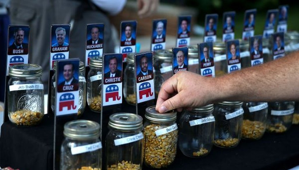 A fairgoer places a vote for Republican presidential hopeful Ben Carson during the Iowa State Fair on Aug. 14, 2015, in Des Moines. (Justin Sullivan/Getty Images)