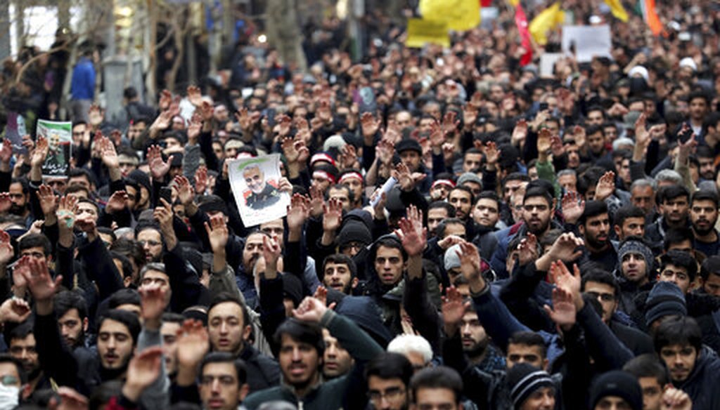 Protesters demonstrate over the U.S. airstrike in Iraq that killed Iranian Revolutionary Guard Gen. Qassem Soleimani in Tehran, Iran. (AP)