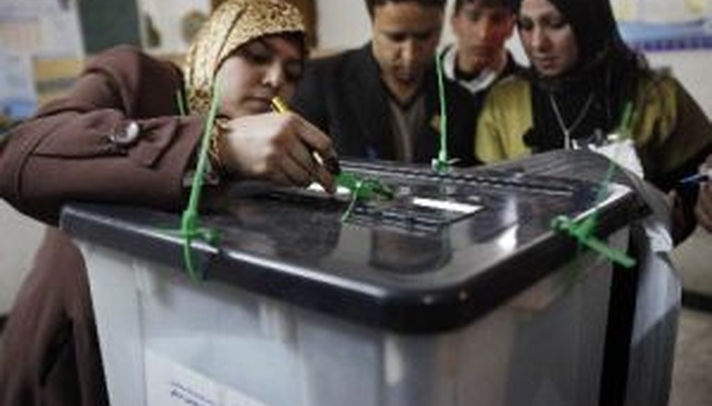 In Baghdad, Iraqi election officials checked ballot boxes in provincial elections on Jan. 31, 2009. Was President Barack Obama right to say that regime change in Iraq has taken eight years?