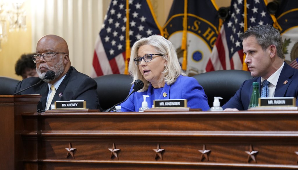 Former Rep Liz Cheney, R-Wyo., gives remarks as Chairman Rep. Bennie Thompson, D-Miss., left, and former Rep. Adam Kinzinger, R-Ill., look on as the House select committee investigating the Jan. 6, 2021, U.S. Capitol attack meets in June 2022 (AP)