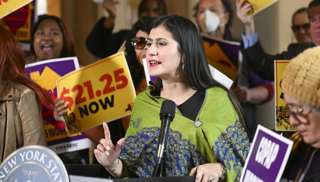 New York state Sen. Jessica Ramos stands with protesters urging lawmakers to raise New York's minimum wage during a rally at the state capitol on March 13, 2023. (AP)