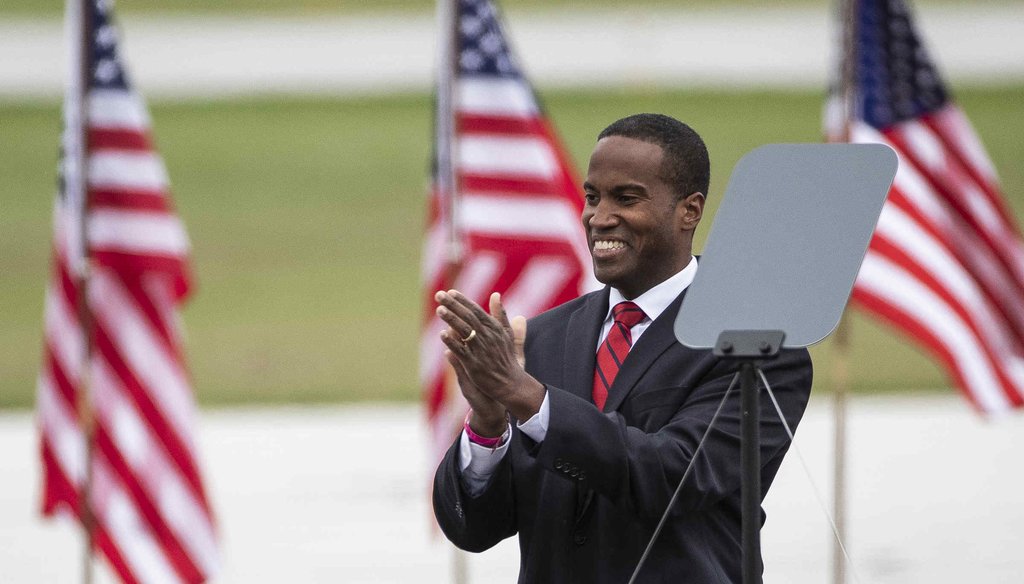 Senate candidate John James speaks during a President Donald Trump rally at the MBS International Airport in Freeland on Sept. 10, 2020. (Mandi Wright, Detroit Free Press)