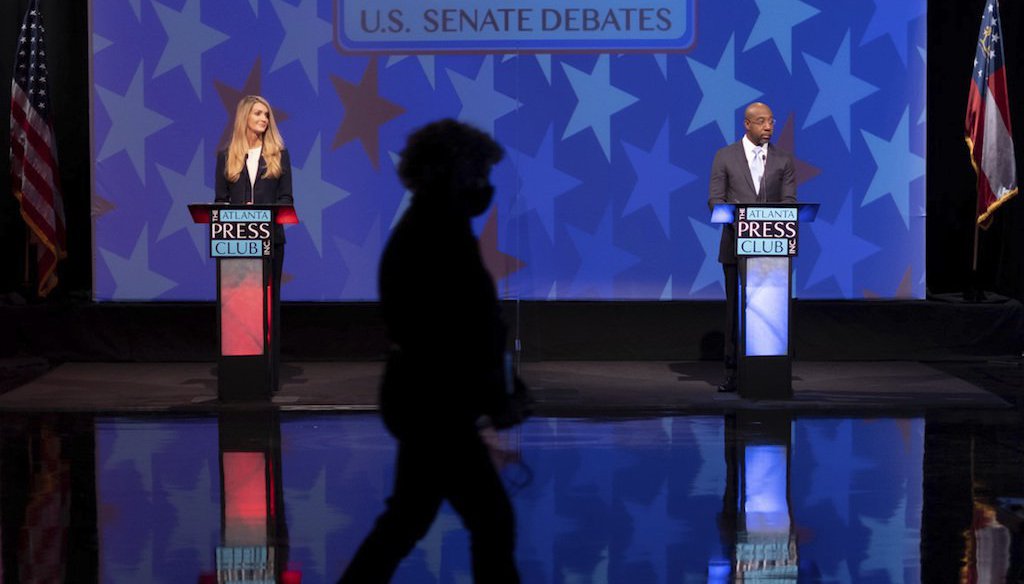 Sen. Kelly Loeffler, R-Ga., and the Rev. Raphael Warnock, her Democratic challenger in a Jan. 5, 2021, runoff election, at a debate in Atlanta on Dec. 6, 2020. (AP)