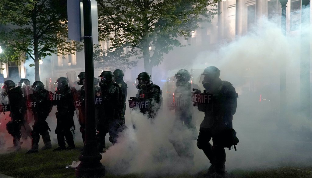 Police clear a park during clashes with protesters outside the Kenosha County Courthouse late Tuesday, Aug. 25, 2020, in Kenosha, Wis., during demonstrations over the Sunday shooting of Jacob Blake. (AP)