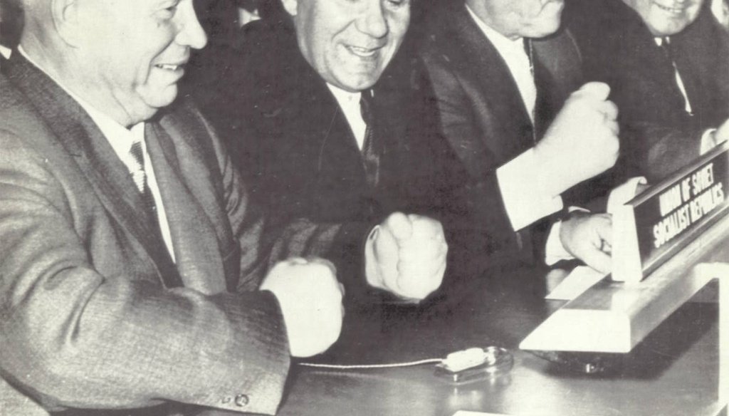 Soviet Premier Nikita Khrushchev pounds his fist on the desk while seated with his delegation a few days before he was reputed to have used his shoe to bang on the desk during a meeting at the United Nations.