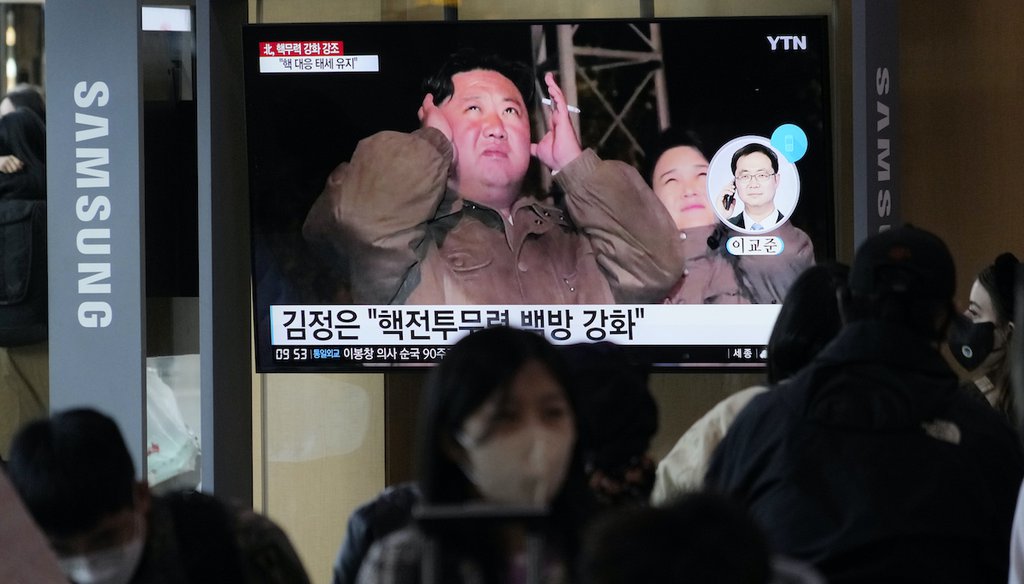 A TV screen shows an image of North Korean leader Kim Jong Un and his wife Ri Sol Ju during a news program at the Seoul Railway Station in Seoul, South Korea, Monday, Oct. 10, 2022. (AP)