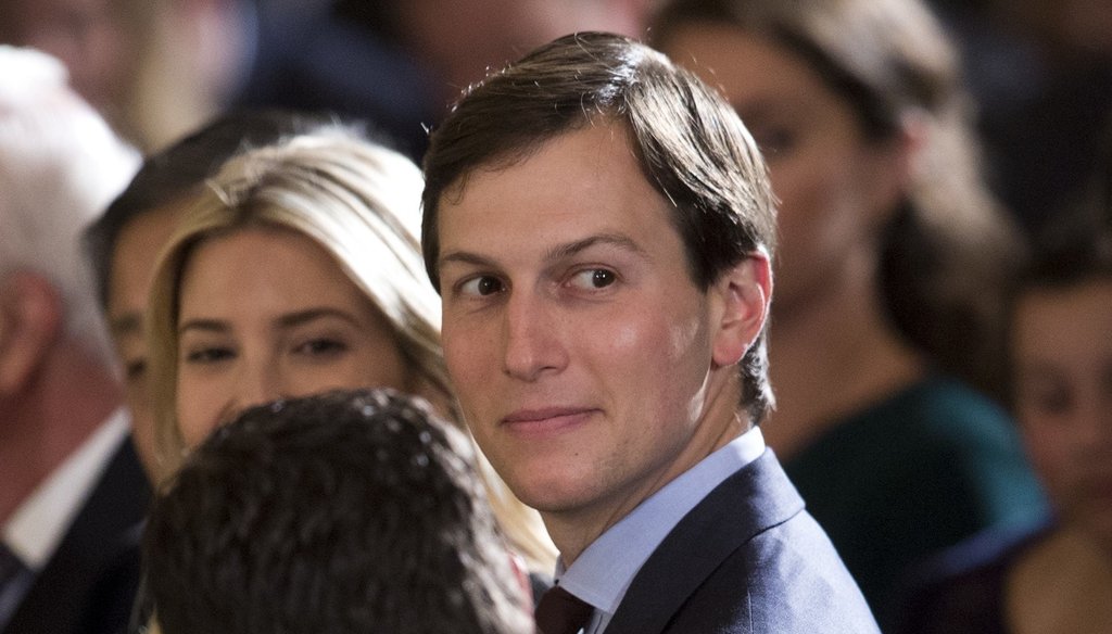 Jared Kushner, with wife Ivanka Trump, sits in the White House’s East Room in June. (Carolyn Kaster/AP)