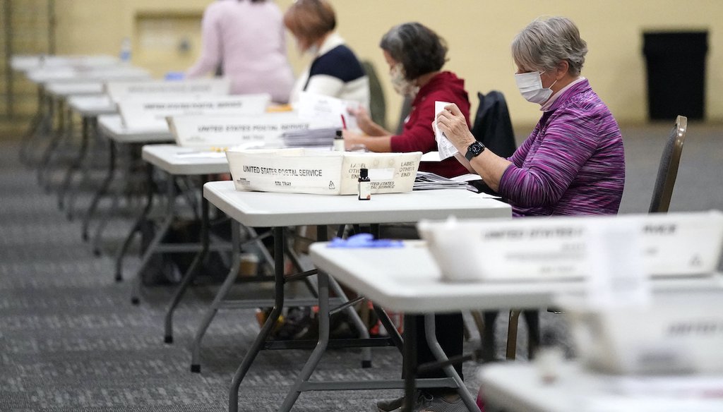 Workers prepare main-in ballots for counting, Wednesday, Nov. 4, 2020, at the convention center in Lancaster, Pa., following Tuesday's election. (AP)