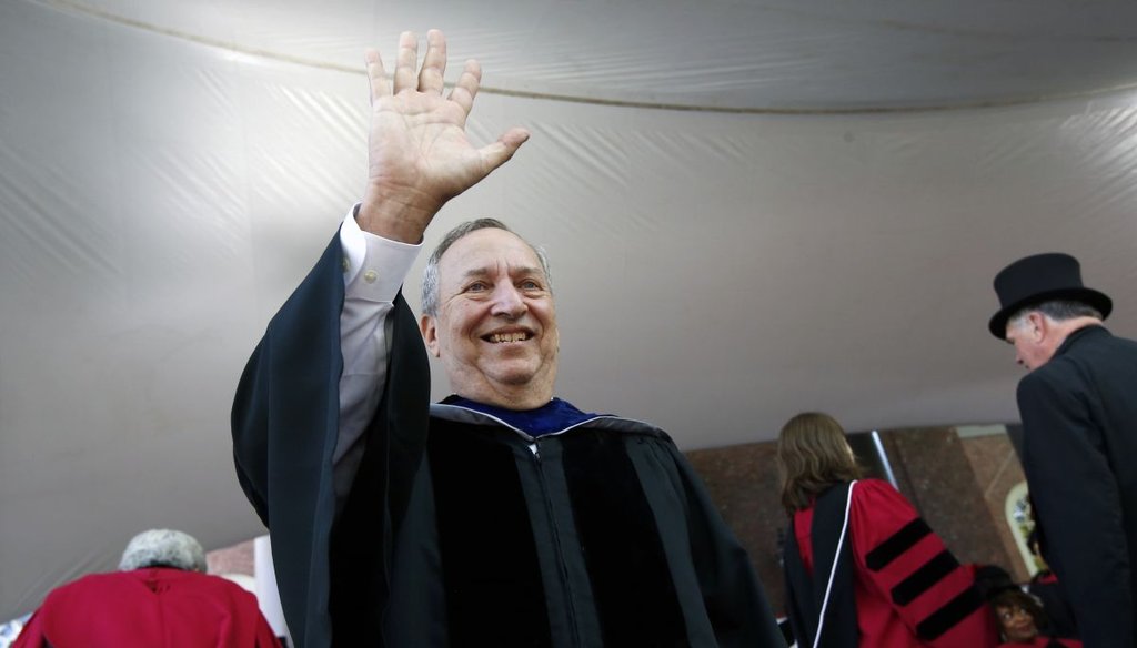 Larry Summers waves during Harvard University commencement exercises in 2018. (AP)