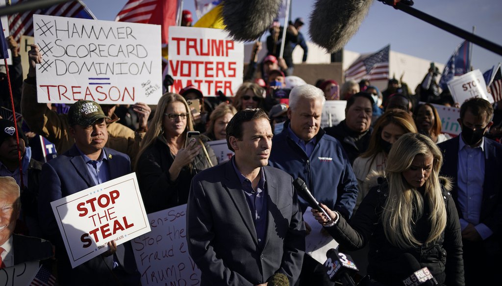 On Nov. 8, 2020, former Nevada Attorney General Adam Laxalt, middle speaking at microphone, and American Conservation Union Chairman Matt Schlapp speak during a news conference outside of the Clark County Election Department in North Las Vegas. (AP)