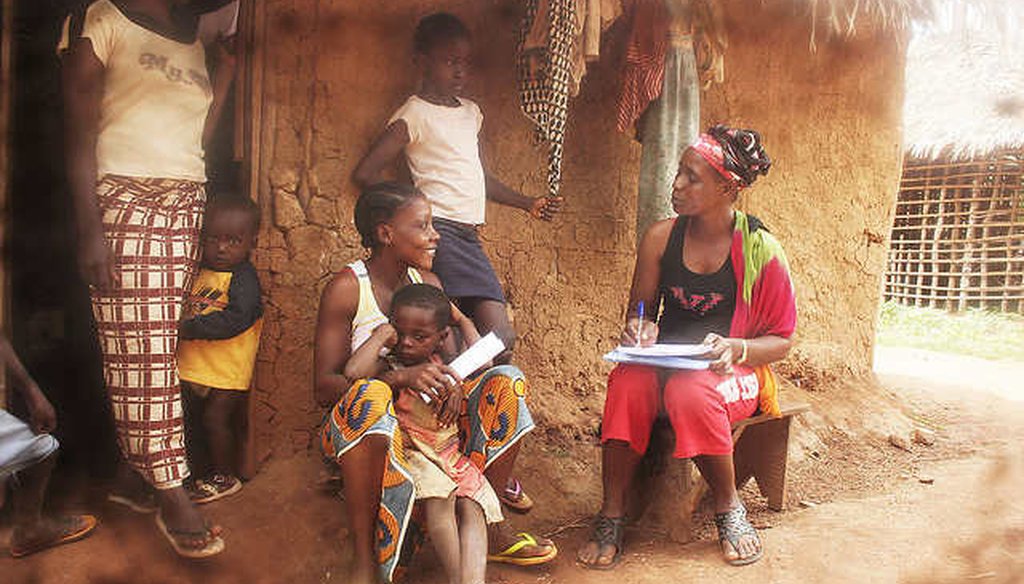 A health care workers interviews residents in Billibo, Liberia, a country that lacks key data on poverty. (Direct Relif, via Flickr Creative Commons)