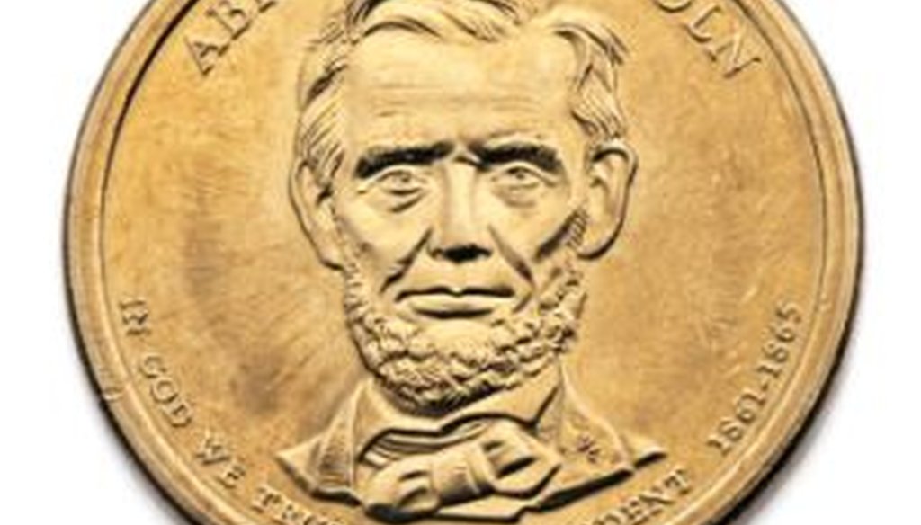 This dollar coin featuring Abraham Lincoln is one of the presidential coins that has "In God We Trust" on its face