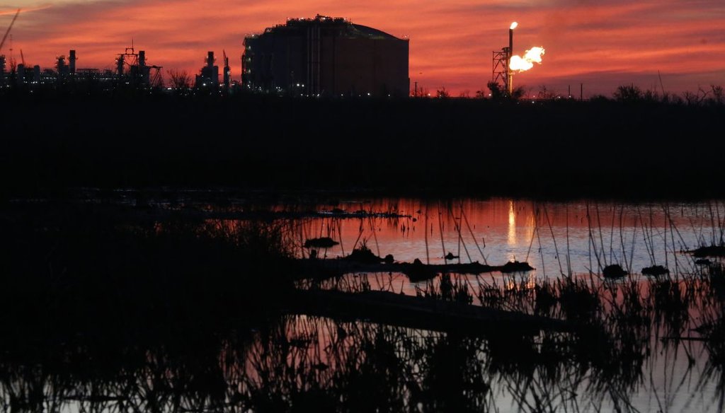 A flare burns at Venture Global LNG in Cameron, La., in 2022. The facility, which exports liquefied natural gas, is one of several like it along the Gulf Coast. (AP)