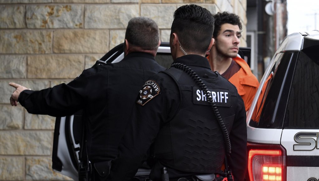 Luigi Nicholas Mangione is escorted into Blair County Courthouse, Dec. 10, 2024, in Hollidaysburg, Pa. (AP)