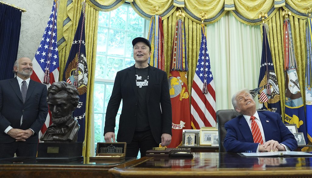 President Donald Trump, from right, and Elon Musk attend a news conference as Commerce Secretary Howard Lutnick looks on in the Oval Office of the White House, May 30, 2025, in Washington. (AP)