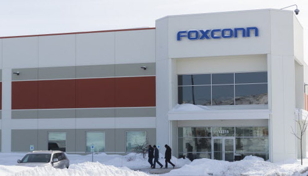 A group exits a Foxconn building Jan. 31, 2019, on Globe Drive in Mount Pleasant, Wis. (Mark Hoffman / Milwaukee Journal Sentinel.)