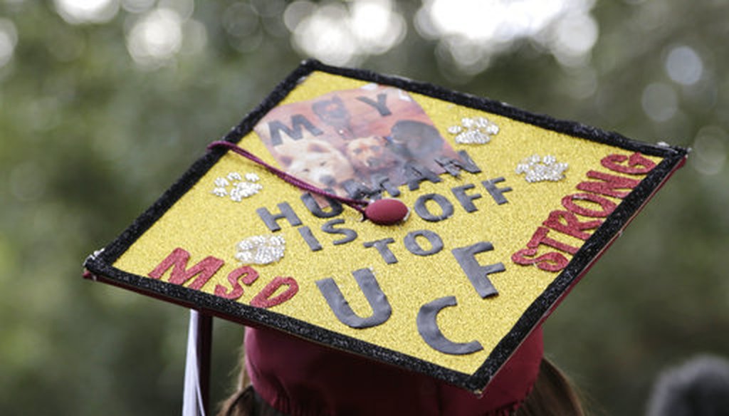 Graduate Shannon Recor leaves a graduation ceremony for Marjory Stoneman Douglas seniors, Sunday, June 3, 2018, in Sunrise, Fla. (AP)