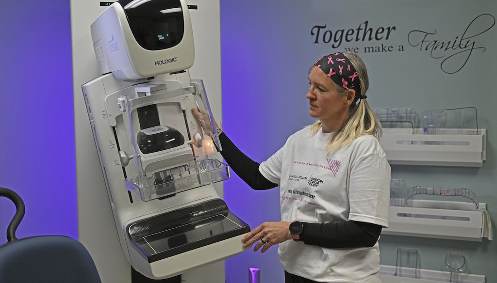Renee Jeria, the imaging manager, shows the working of the mammography screening machine at the Samuel U. Rodgers Health Center on April 25, 2023 in Kansas City, Mo. (AP)