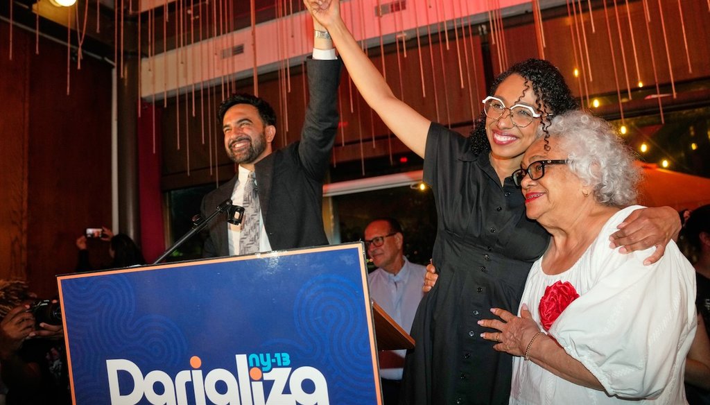 New York City Mayor Zohran Mamdani celebrates with Democratic congressional candidate Darializa Avila Chevalier, center, and community member Carmen Rojas during an election night watch party June 23, 2026, in New York. (AP)