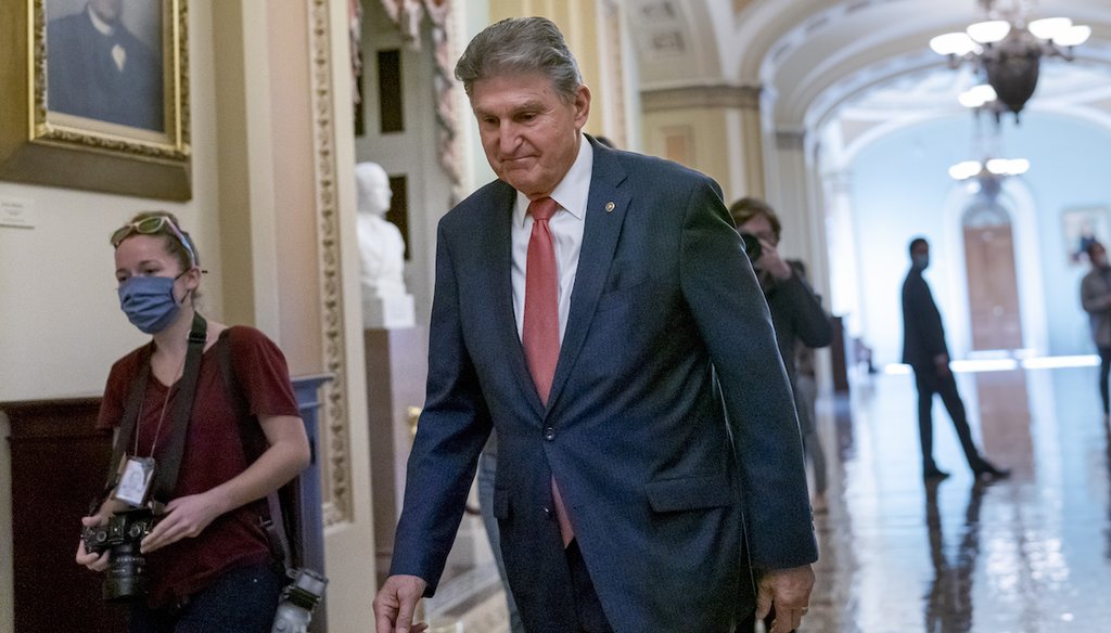 Sen. Joe Manchin, D-W.Va., walks to a caucus lunch at the Capitol in Washington. (AP)