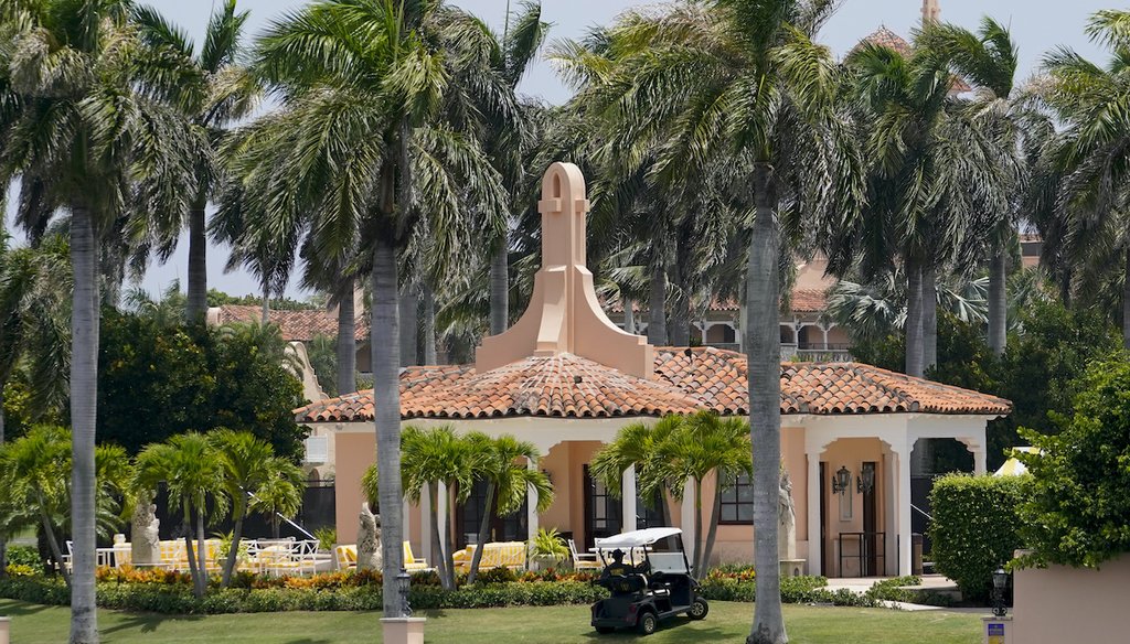 Security moves in a golf cart at former President Donald Trump's Mar-a-Lago estate, Tuesday, Aug. 9, 2022, in Palm Beach, Fla. (AP)