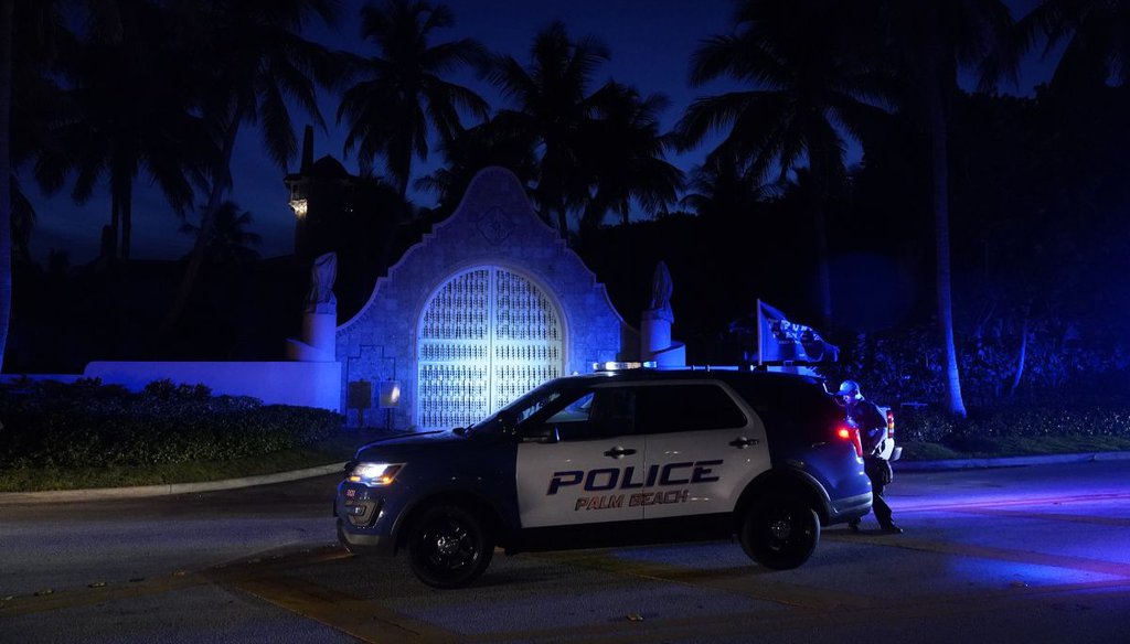 Police stand outside an entrance to former President Donald Trump's Mar-a-Lago estate in Palm Beach, Fla., on Aug. 8, 2022. (AP)