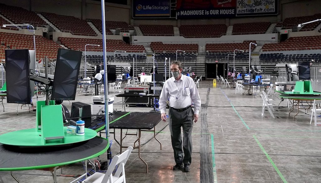 Former GOP Arizona Secretary of State Ken Bennett walks inside the Arizona Veterans Memorial Coliseum on April 22, 2021, during setup for an audit of the county's 2020 presidential election results. The audit was ordered by the GOP-led state Senate. (AP)