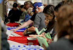 Arizona’s widespread use of mail-in voting and close margins created longer wait for results
