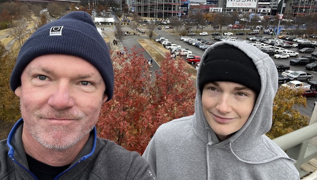 Matthew Raine, left, and son, Adam Raine, pose in front of the Nissan stadium in Nashville, Tennessee, on Dec. 15, 2024. (Photo courtesy the Raine family)