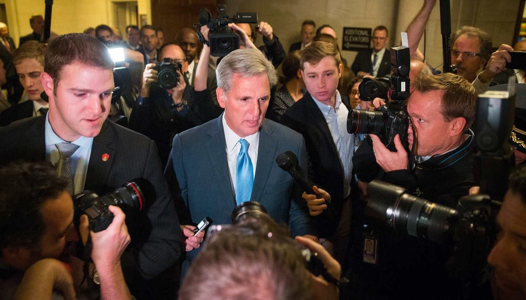 House Majority Leader Kevin McCarthy (R-Calif.) , surrounded by reporters, unexpectedly dropped his bid to be House Speaker. (NYT)