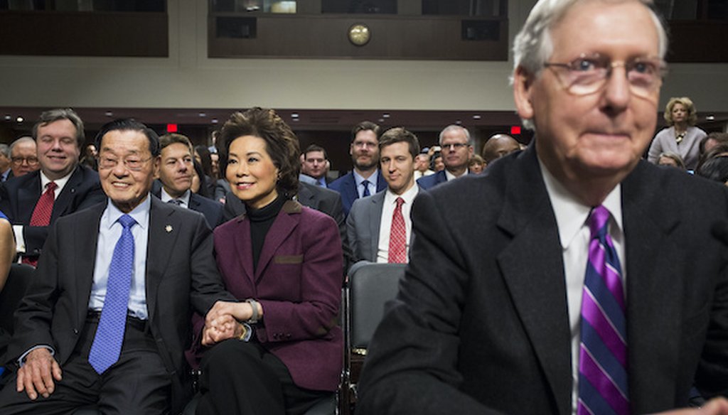 Secretary of Transportation-designate Elaine Chao sits with her father James Chao in Washington in 2017, prior to the start of her confirmation hearing where her husband, Senate Majority Leader Mitch McConnell introduced her. (Associated Press)