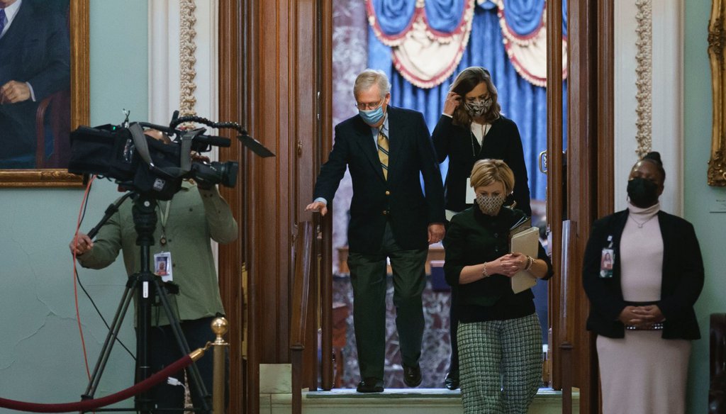 Senate Minority Leader Mitch McConnell, R-Ky., leaves the chamber after the Senate voted not guilty in the impeachment trial of former President Donald Trump. (AP Photo/J. Scott Applewhite)