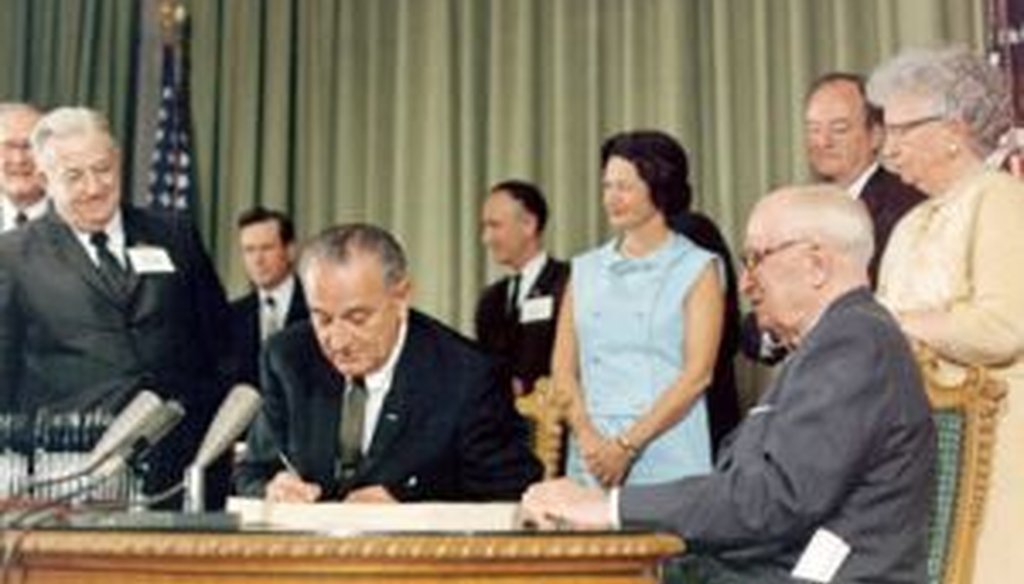 President Lyndon B. Johnson signed Medicare in 1965. Political attacks about Medicare started even before that.
