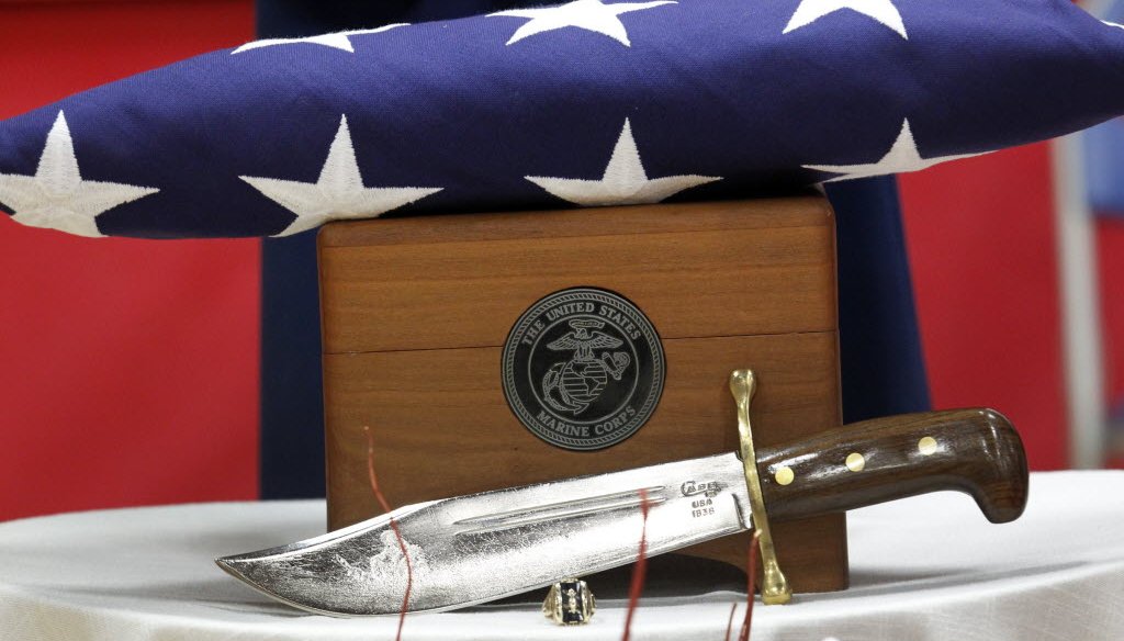 An urn holds the remains of Marine Lance Cpl. Merlin Allen at his funeral in Bayfield, Wis., on June 29, 2013. Allen was lost on June 30, 1967, in Thua Thien-Hue Province, Vietnam, in a helicopter crash. His remains were identified in February 2013.