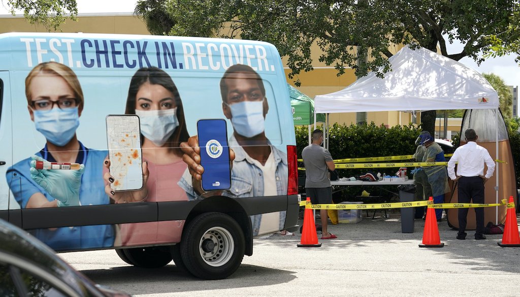 People wait in line at a Miami-Dade County COVID-19 testing site on July 26, 2021, in Hialeah, Fla. (AP)