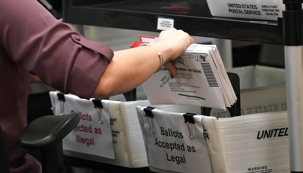 In this Oct. 26, 2020, file photo an election worker sorts vote-by-mail ballots at the Miami-Dade County Board of Elections in Doral, Fla. (AP)