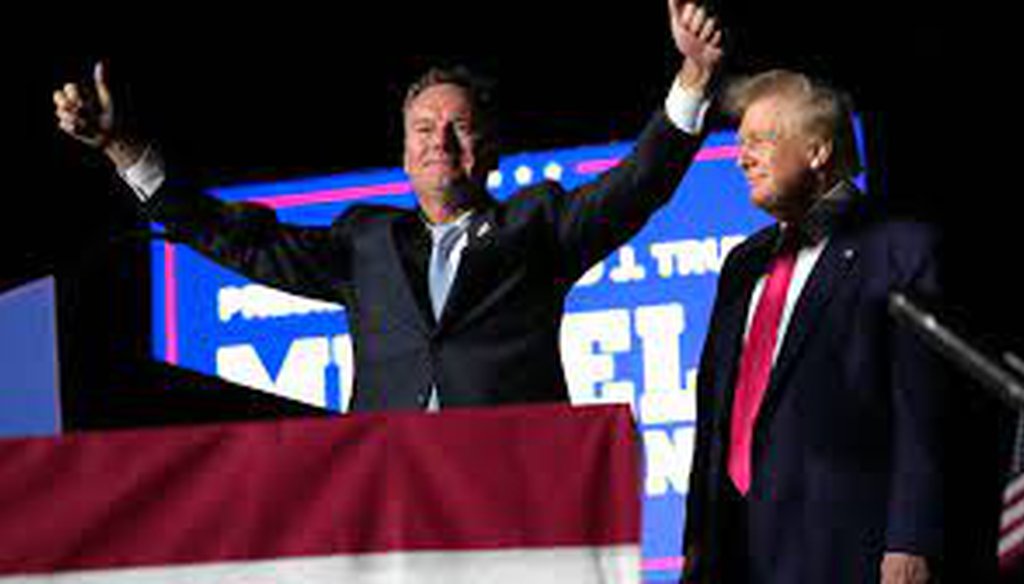 Republican candidate for governor Tim Michels, left, appears with former President Donald Trump during a campaign rally for Michels at the Waukesha County Fairgrounds in Waukesha on Friday, Aug. 5, 2022. Mike De Sisti / Milwaukee Journal Sentinel