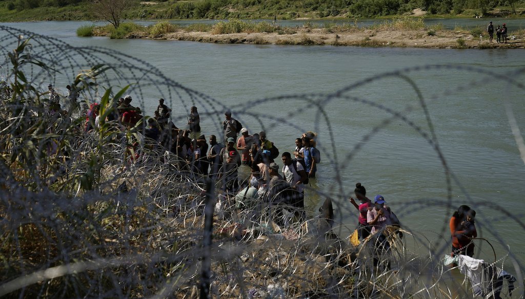 Migrants who crossed into the U.S. from Mexico are met with concertina wire along the Rio Grande, Sept. 21, 2023, in Eagle Pass, Texas. (AP)