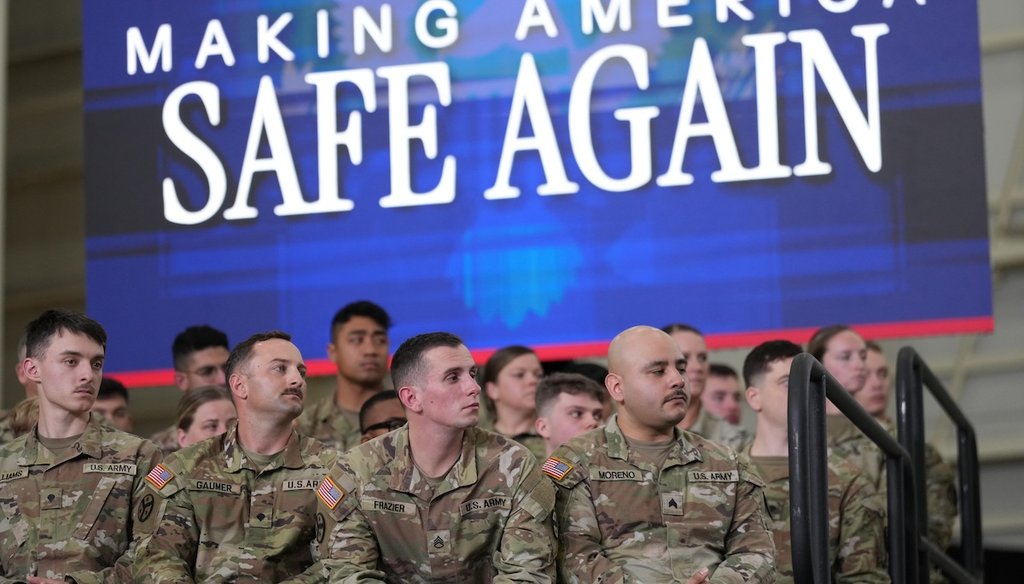 U.S. Army Soldiers look on as President Donald Trump participates in a roundtable discussion on public safety at a Tennessee Air National Guard Base on March 23, 2026. (AP)