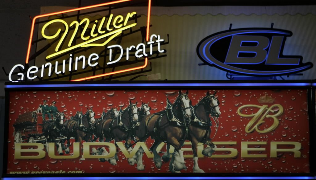 No, Miller and Anheuser-Busch aren't American companies any more. (AP photo)